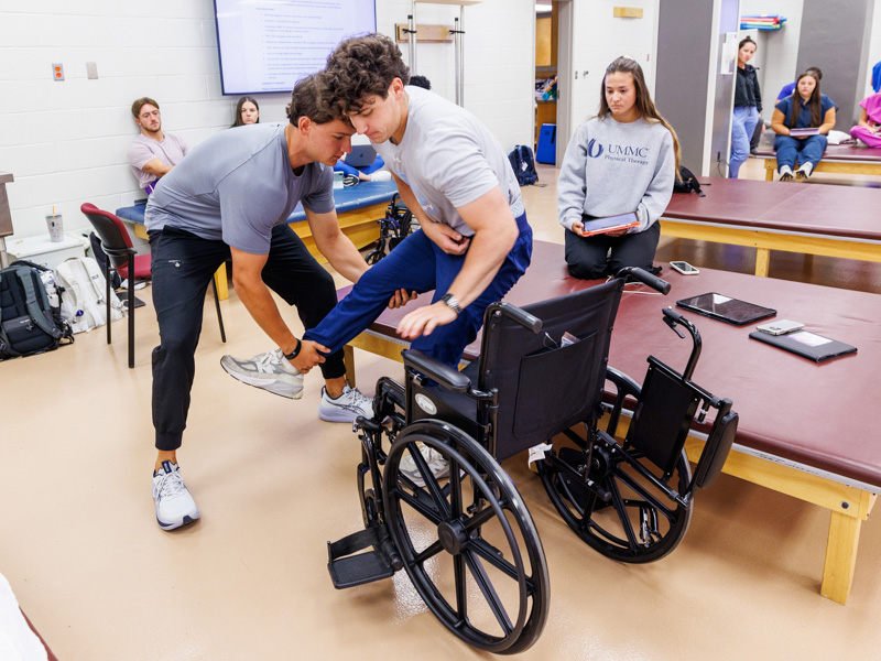 Tristen Foster, left, Timothy Brewer, AnnaLeigh Jones, all students in the Doctor of Physical Therapy program, participate in Acute Care in Physical Therapy II class in the PT lab.