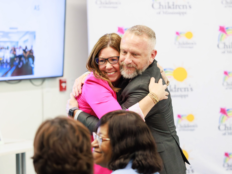 Kristin Hardy, director of Children's quality, magnet and transition to practice, and Wesley Smith, Chief Nursing Officer celebrate Children's of Mississippi's Magnet recognition.