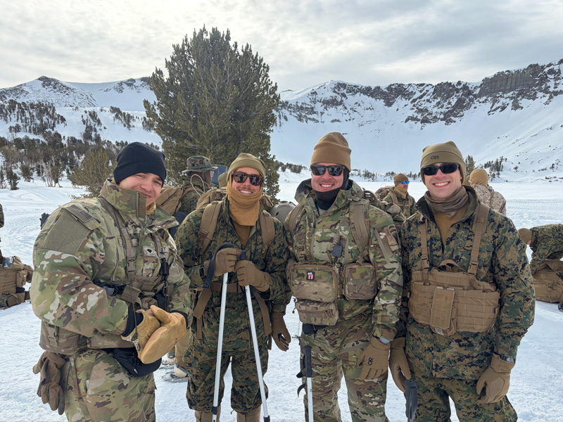 Gaouette, far right, stands with fellow military medical officers during their first excursion into the mountains. Pictured from left are an Army medic with the 11th Airborne Division, a Navy flight surgeon, another Army medic with the 11th Airborne Division and Gaouette.
