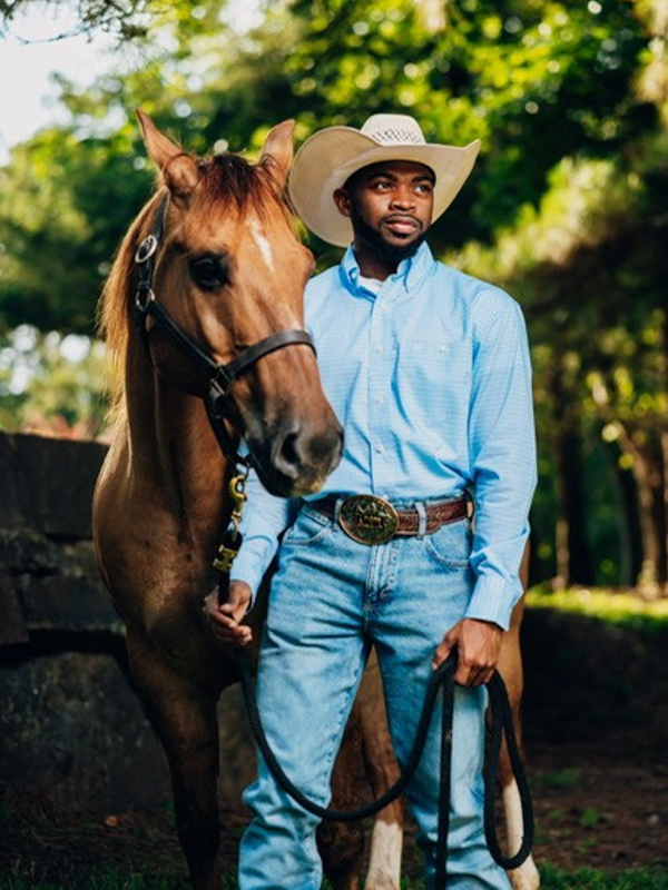 Avid rider Young says working with horses has strengthened the patience, consistency and careful observation he brings to scientific research.