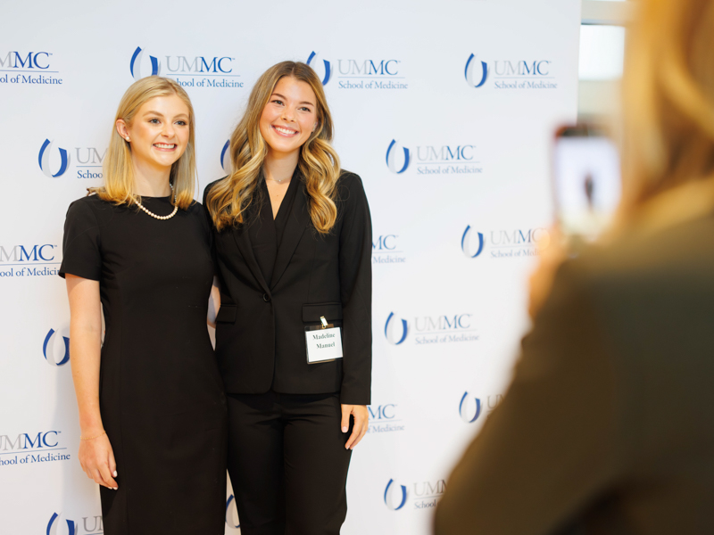 First-year medical students Mary Griffin Jackson, left, and Madeline Manuel pose for a photo on the first day of M1 Welcome Week. Melanie Thortis/ UMMC Communications