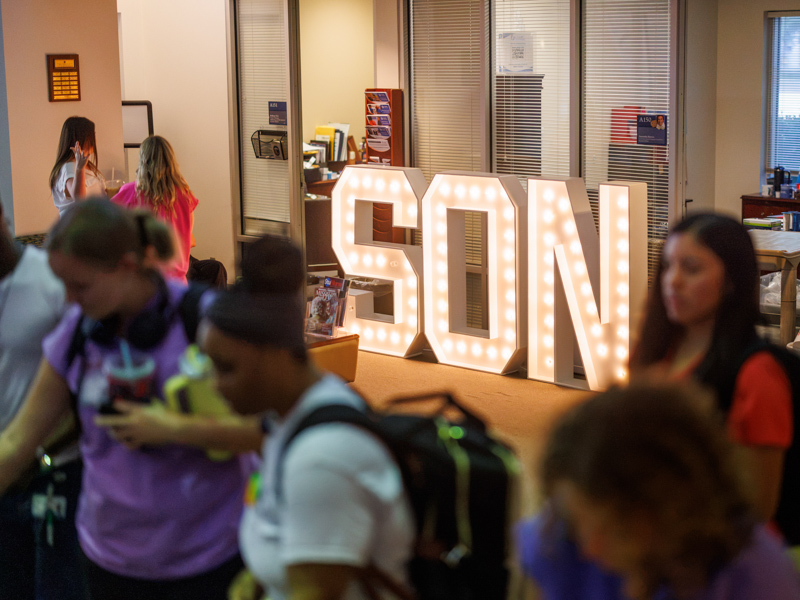 Lights brighten a hallway at the School of Nursing on Monday as students reported for the first day of classes for the fall semester. Joe Ellis/ UMMC Communications