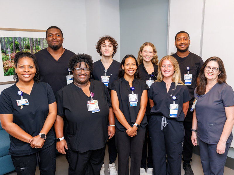 The mobility technician team, back row from left, Tavian Johnson, John Stephen Nasekos, Claire Brantley, Amos Hightower; front row, Undrea Nash, mobility tech supervisor, Kayla Kelly, Richelle Sanchez, Mary Addison McDaniel and Sacha MacGown, director of inpatient rehabilitation services.