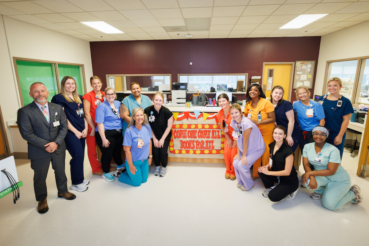 Wesley Smith, chief nursing officer and staff from Wiser NICU celebrate Read-a-thon at the children's hospital.