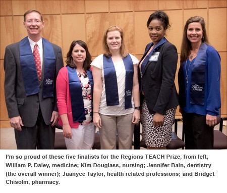 From left, William P. Daley, medicine; Kim Douglass, nursing; Jennifer Bain, dentistry (overall winner); Juanyce Taylor, health related professions; and Bridget Chisolm, pharmacy.