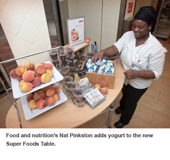 Nat Pinkston adds yogurt to the new superfoods table.