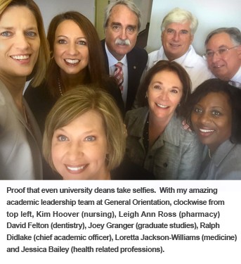 Administration staff poses for a photo. 