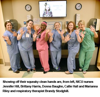 NICU nurses show off their squeaky clean hands.