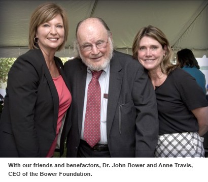 Dr. LouAnn Woodward, left, poses with friends and benefactors, Dr. John Bower and Anne Travis, CEO of the Bower Foundation.