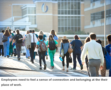 Employees walk to work. 
