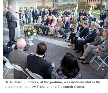 Dr. Richard Summers, at the podium, was instrumental in the planning of the new Translational Research Center.