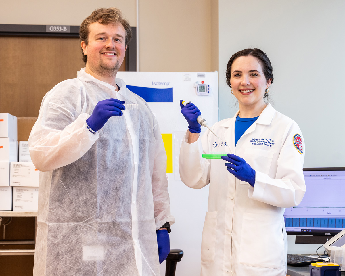 Two researchers working in a science laboratory.