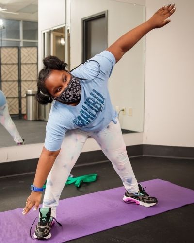 A child participates in exercise as part of the Iron Kids program at CIH