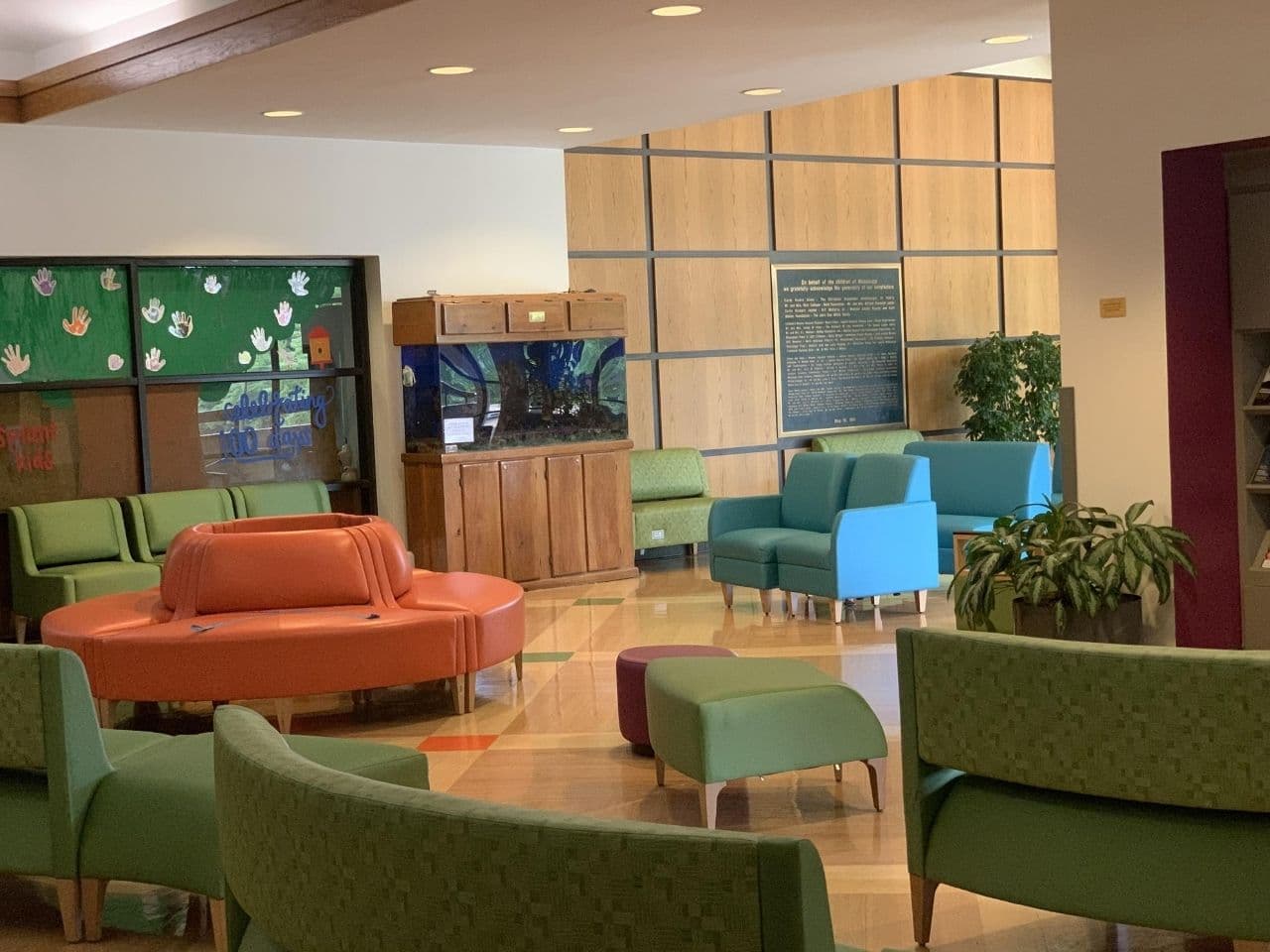 In one corner of the waiting room is a large fish tank.