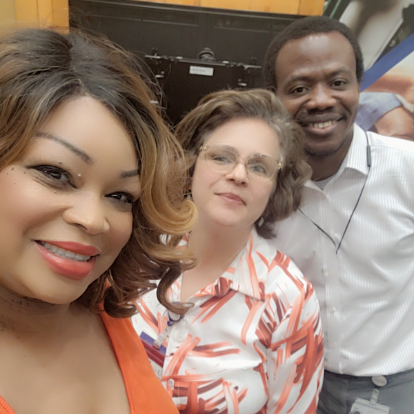Michelle, Leila and Okey in a group selfie.