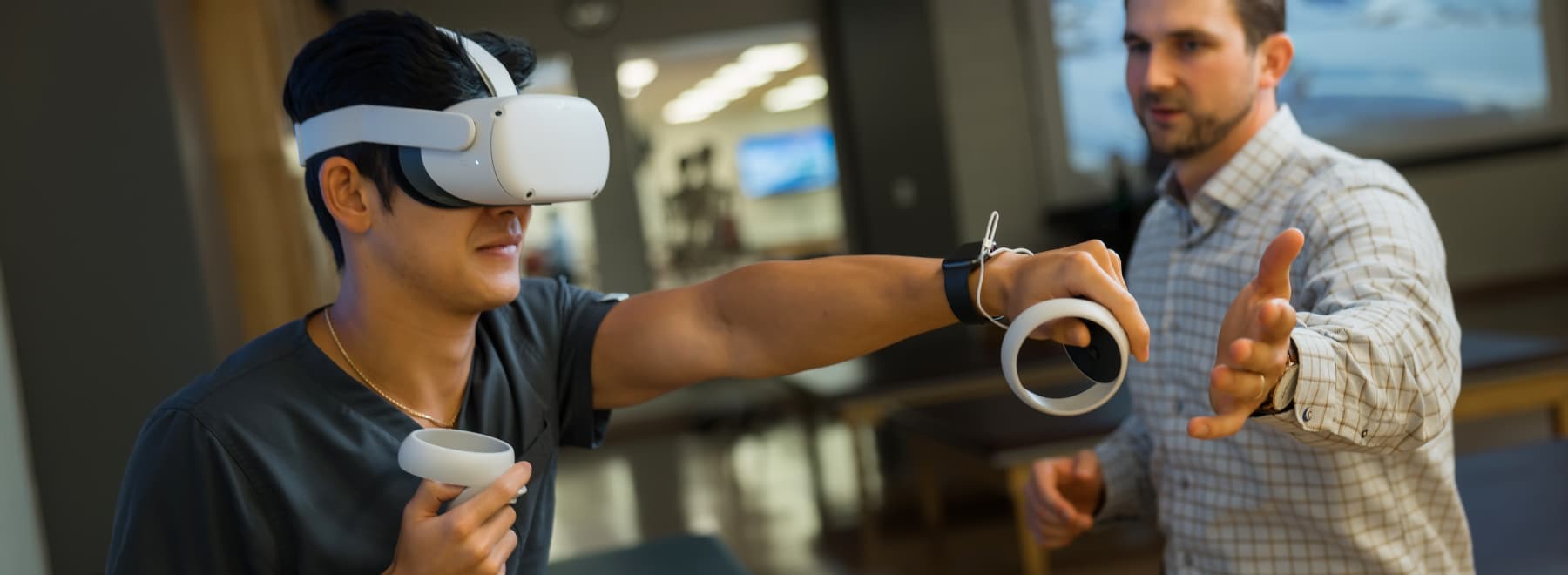A man uses virtual reality equipment to assist movement training.
