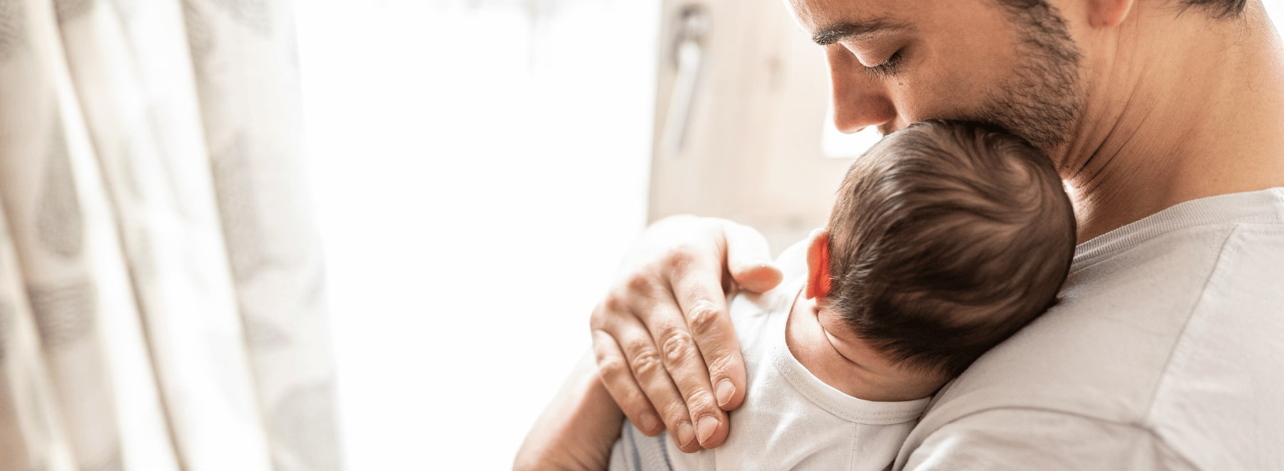 Man holding baby