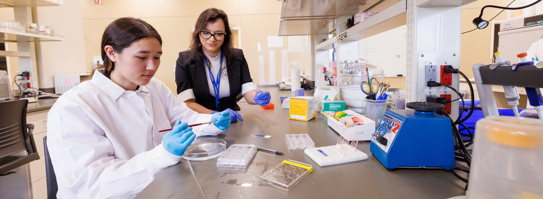 Two female scientists in lab.