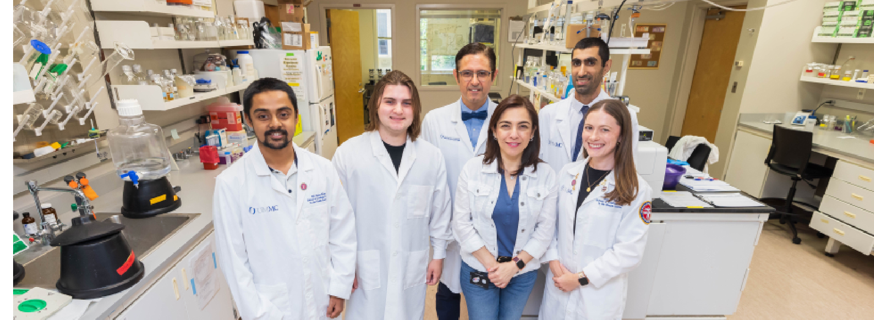 Group photo of Molecular Center of Health and Disease  team members in lab.