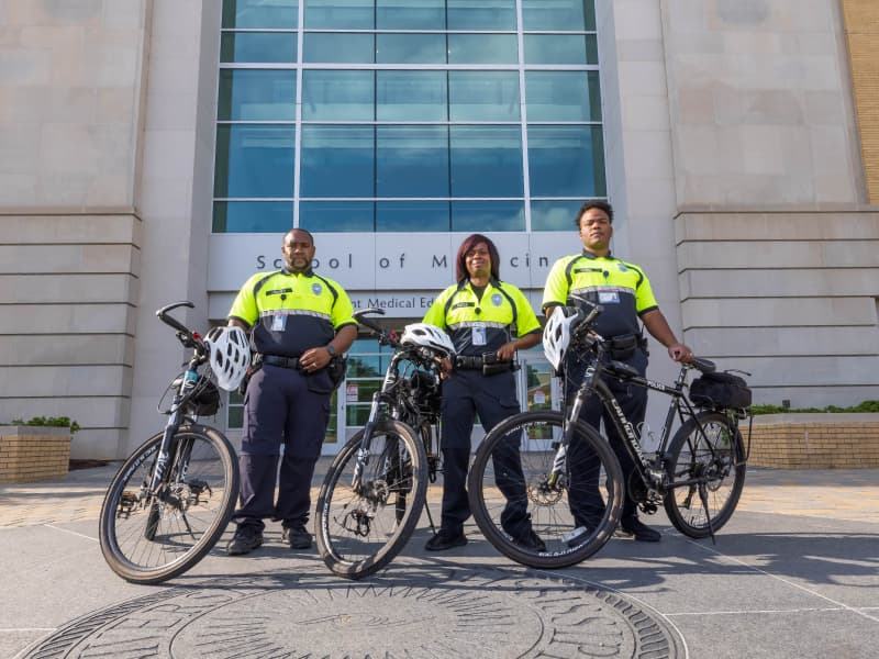 Bike Officers Lindsey, Gates and Horne front of the School of Medicine.