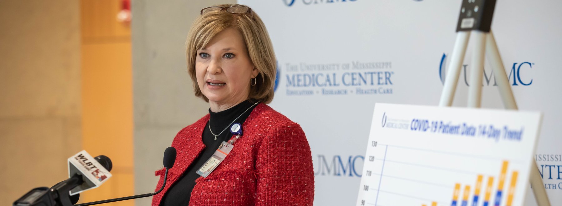 Dr. LouAnn Woodward, vice chancellor for health affairs and dean of the School of Medicine, speaks during a press conference.