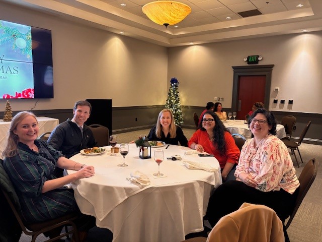 Division of Hematology and Oncology members enjoy a holiday gathering.