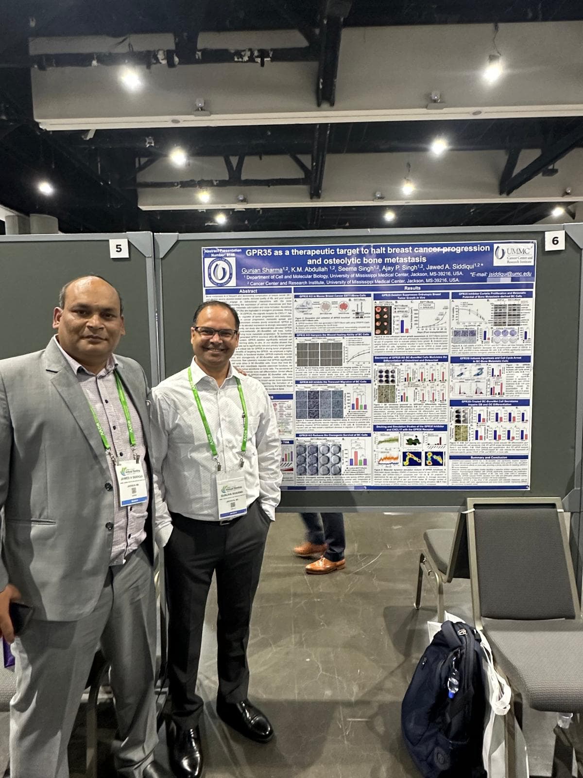 Dr. Jawed Siddiqui and Dr. Gunjan Sharma stop for a photo at the AACR Annual Meeting.