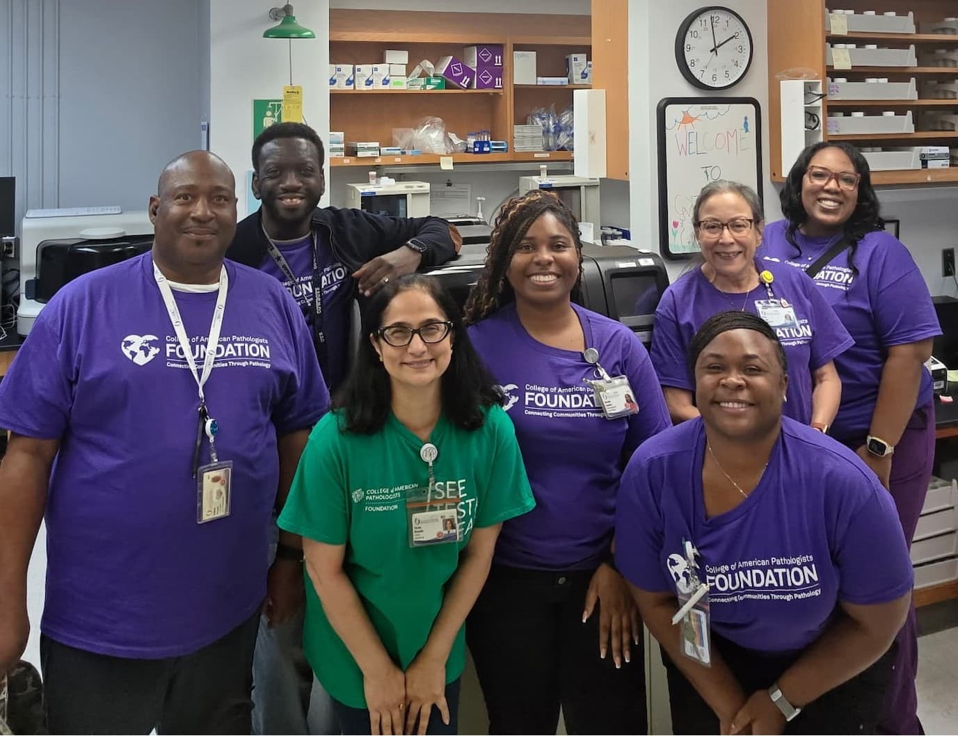 Cytology volunteers smile for a photo during See, Test and Treat.