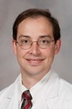 Portrait of Dr. Trey Abraham