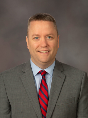 head shot of Dr. Joseph Tacy