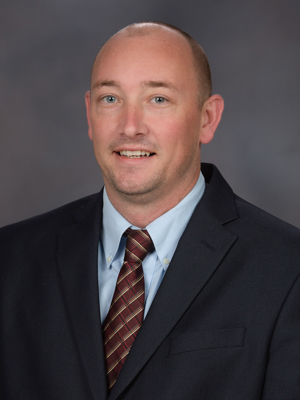 Faculty headshot of Joshua Speed.