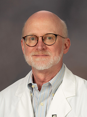 Portrait of  Dr. Tom Mosley