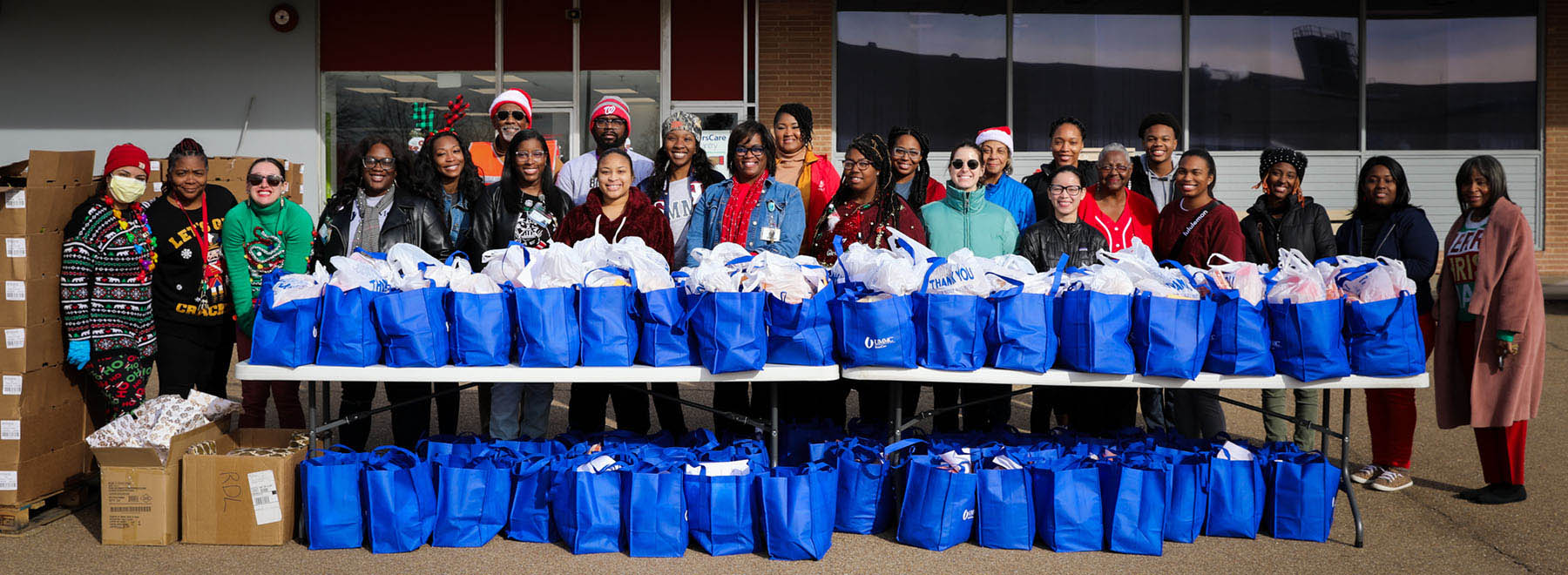 Volunteers for the EversCare Food Pantry during the Christmas season of 2023