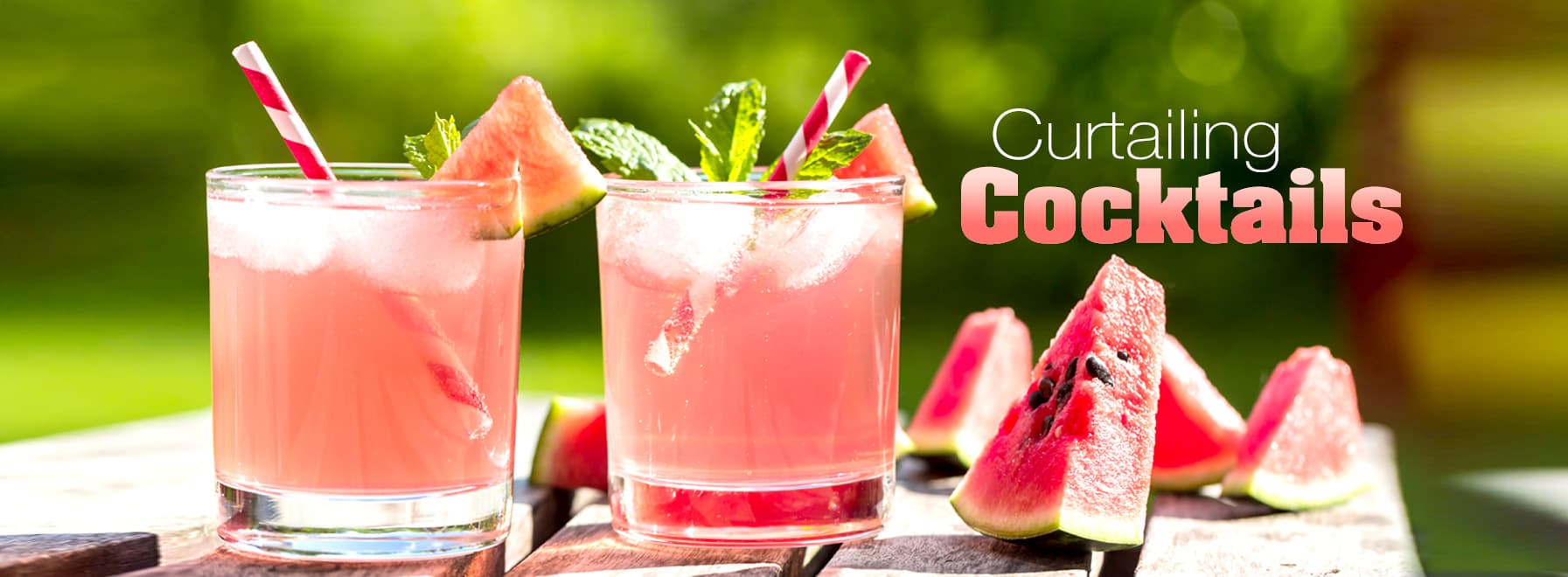 Image of two watermelon cocktails on wooden table