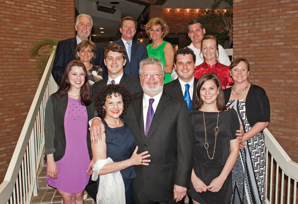 Parker is surrounded by family at a recent event celebrating completed funding of his endowed chair. Clockwise from top left are his brother-in-law, Mel Rhodes, nephew John Rhodes and wife Lisa, nephew John Parker and wife Kelly, niece Suzy Parker Johnson, son Lee Parker and wife Maggie, Kerry Parker, son Ben Parker and girlfriend Sterling Cato, and Mel's wife Karen.