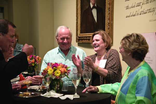 Dr. Edward Gore of Tupelo, Class of 1964, and his wife Claudia Gore enjoy a moment with friends.