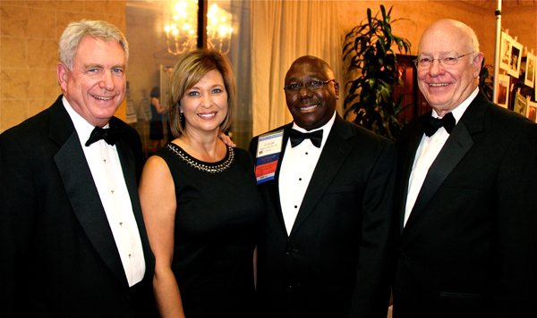 University of Mississippi leaders are on hand to witness the inauguration of Dr. Claude Brunson, second from right, as the new president of the Mississippi State Medical Association on Aug. 15. With him are, from left, Dr. Dan Jones, University of Mississippi chancellor; Dr. LouAnn Woodward, UMMC associate vice chancellor for health affairs and vice dean of the School of Medicine; and Dr. James Keeton, UMMC vice chancellor for health affairs and dean of the School of Medicine.