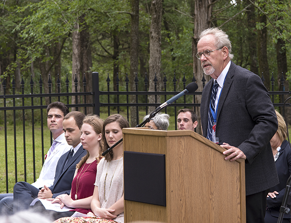 Dr. Alan Sinning, professor of neurobiology and anatomical sciences and director of the Body Donation Program, reads the names of those who donated their bodies in 2016.