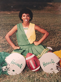 Besides playing basketball and running track, Poe was a cheerleader for her high school.