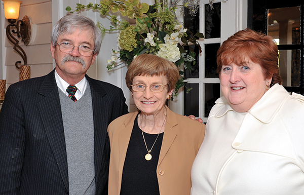 In this December 2010 photo, Dr. Owen B. Evans, then-chair of the Department of Pediatrics, visits with Dr. Jeanette Pullen, center, professor emeritus of pediatrics, and Megason.