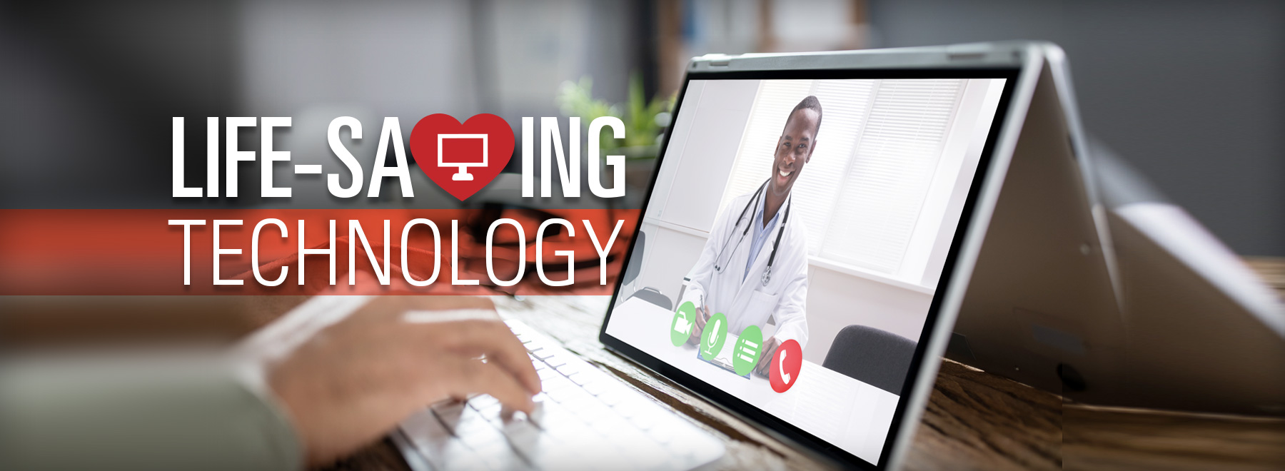 Person viewing an African-American doctor via telehealth on computer.