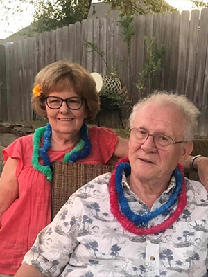 Virginia Covington and husband John get in the spirit during a luau party in September 2019. (Photo courtesy of Christina McAlpin)