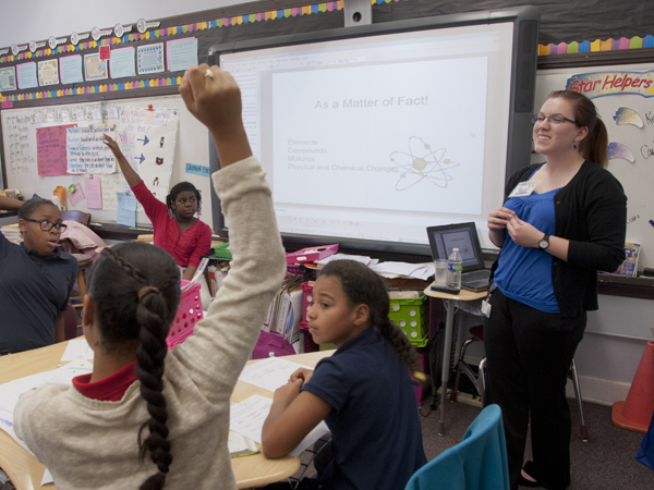 Proof positive that Shirey's approach is working: Students are always anxious to answer her science questions.