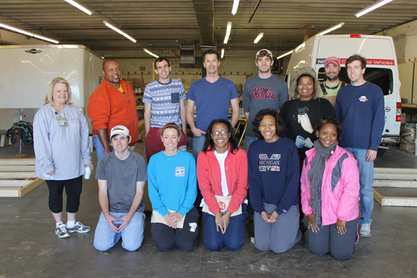 Among the School of Nursing faculty and students participating in a service learning project building sheds for new Habitat for Humanity builds and re-sale houses are, front row from left, Brett Reiter, accelerated B.S.N. student; Kayla King, accelerated B.S.N. student; Tiara Turner, traditional B.S.N. junior; Jalisa Williams, traditional B.S.N. junior; and Monica Wade, administrative assistant in student affairs; and back row from left, Tammy Dempsey, director of student affairs and service learning; Donald Horne, post masters student; Jonathan Smith, accelerated B.S.N. student; Chris Vinson, M.S.N. student, Dalton Montgomery, traditional B.S.N. junior; Amanda Osborne, traditional B.S.N. junior; Sammy Johnson, M.S.N. student; and Bobby Wilkerson, accelerated B.S.N. student.