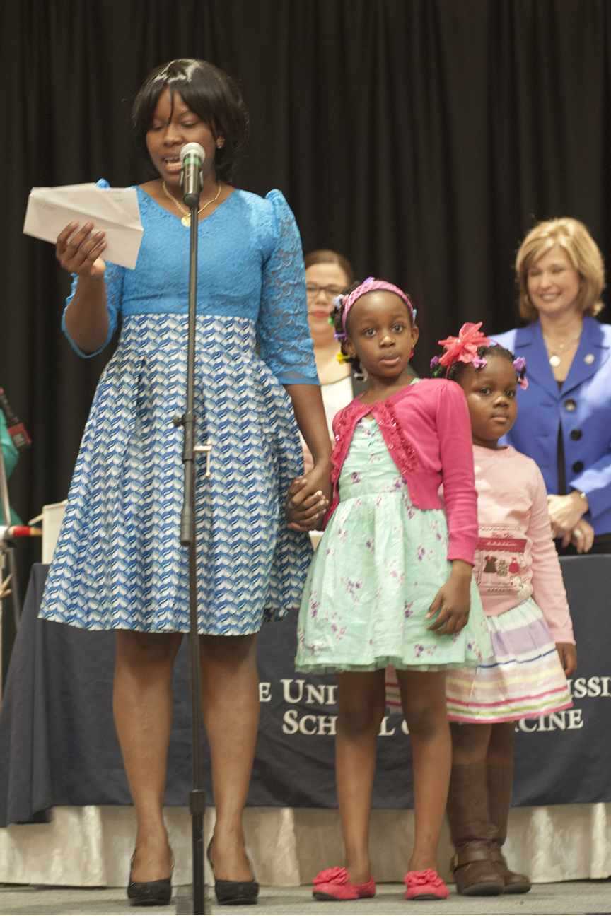 Maureen Offiah, with daughters Somto and Kumsiyonna, announces she will stay in Jackson for her residency. Next year she will enter the dermatology program at UMMC.