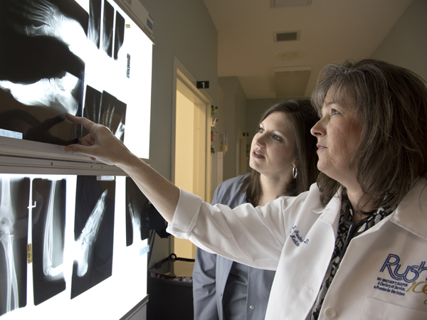 At Primary Care Associates in Meridian, Goodman and staff nurse Holly Hurst, LPN, examine an X-ray. Goodman is one of four physicians at the clinic.