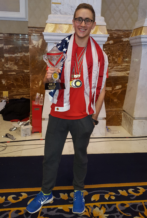 Mullen shows off Team USA's second-place trophy.