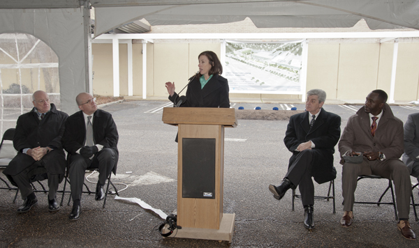 Henderson, center, speaks about UMMC's Center for Telehealth's plans for the new site