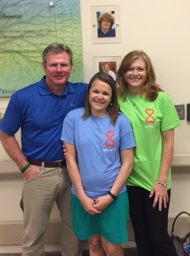 Jackson residents David and Sheila Wilbanks met Foley, Ala., resident Sarah Thornbury (center), who received their son Walker's kidney and pancreas, during the 2015 Legacy Lap.