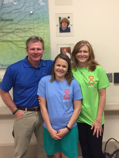 Jackson residents David and Sheila Wilbanks met Foley, Ala., resident Sarah Thornbury (center), who received their son Walker's kidney and pancreas, during the 2015 Legacy Lap.